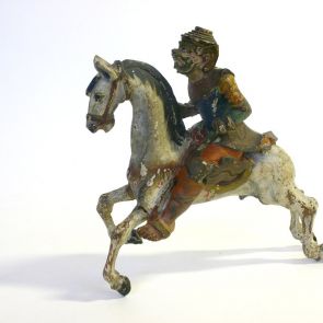 Demon figure riding a horse