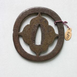Tsuba with the shape of four flowers in a circle, openwork with sayagata pattern inlaid in Kaga zōgan