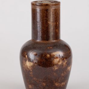 Small brownish-yellowish vase