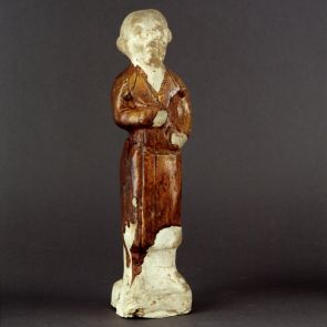 Standing male figure with Iranian features