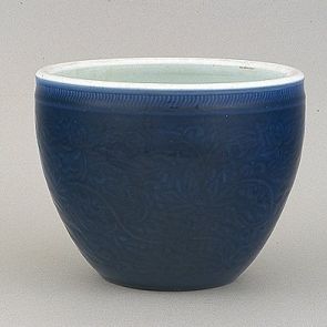 Vessel for flowers with plant motifs