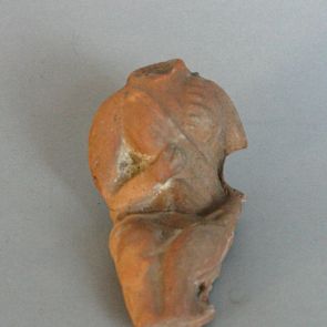 Fragment of a seated female figure