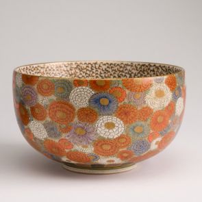 Satsuma ware bowl decorated externally with flowers (millefiori) and internally with butterflies