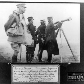 General Kuroki, commander of the 1st Imperial Japanese Army, looking through the prismatic telescope produced by Henry Kahn and Co. (San Francisco), in the presence of Sir Ian Hamilton, British military attaché (on the left)