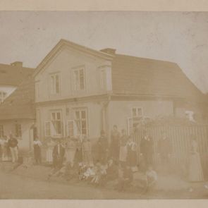 Firemen's band in front of the Hampl house