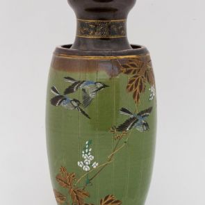 Green vase decorated with bird-and-flower motifs