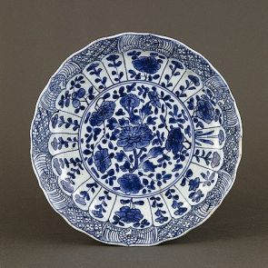 Dish decorated with floral and phoenix motifs in radial panels