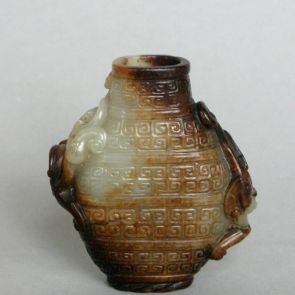Perfume container with striped decoration characteristic for bronze vessels
