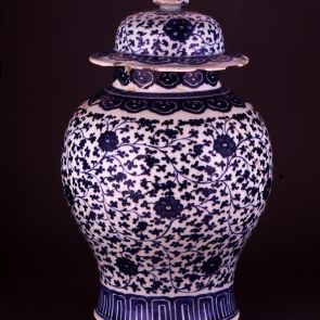 Covered vase with floral motifs