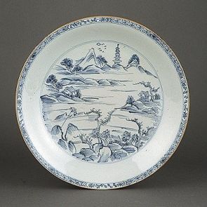 Round plate with a landscape