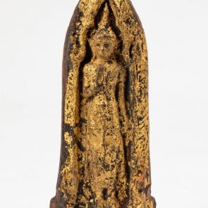 Votive plaque: standing Buddha with "fear-dispelling" gesture