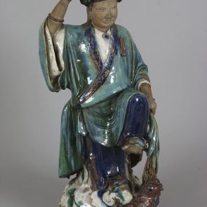 Flower stand: Liu Hai as a boy carrying a tray on his head