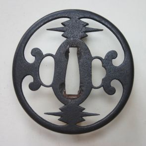 Tsuba with three slots, with geometric and curved motifs