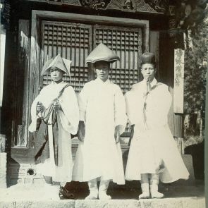 Korean priests outside a shrine