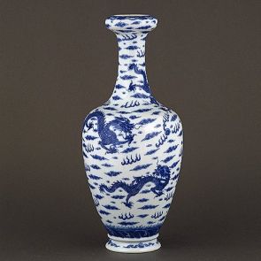 Vase decorated with dragons flying among clouds