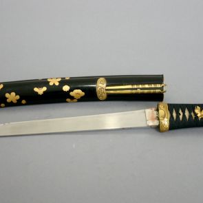 Aikuchi tantō, with plum blossom and flying bees, and with a kōgai