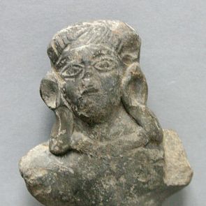 Title Fragment of male figure, very long-eared