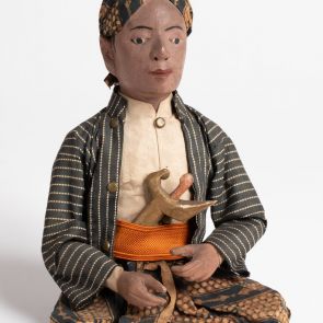 Male figure in traditional Javanese attire