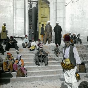 Constantinople. People on the stairs of Fatih Mosque