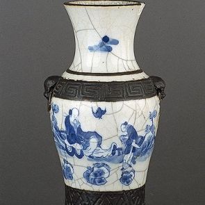 Vase with decorative strips imitating bronze