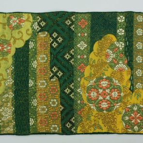 Japanese obi design sample with golden clouds in front of dark green background and flower motifs