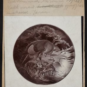 Photo of round Japanese lacquer box on cardboard