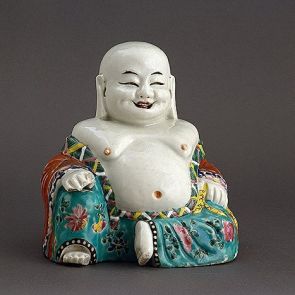 Sitting Budai with a sack in his left hand