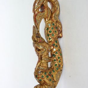 Gilt, glass-inlaid ornament; fragment