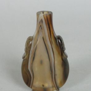 Snuff bottle with mask headed ring handles