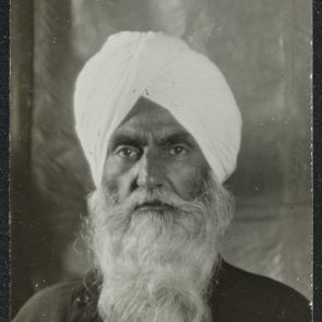 Self-portrait in a shirt buttoned to the side