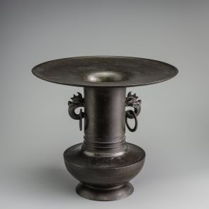 Wide brimmed bronze vase with two handles