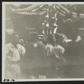 Japanese visitors at Chuzenji Temple in the rain, Nikko