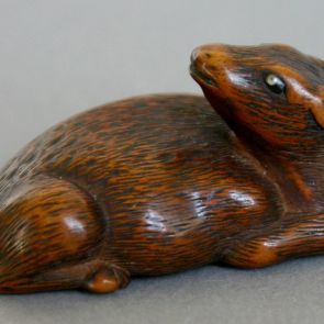 Netsuke: reclining deer