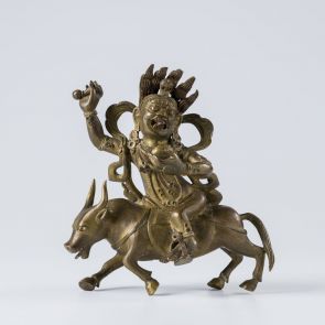 Wrathful female deity riding a bull