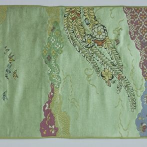 Japanese obi design sample with tsujigahana pattern in front of greyish green background, hakuji orimono brocading