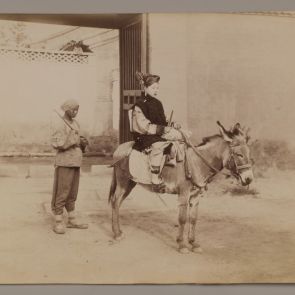 A Manchu lady on a donkey with a servant