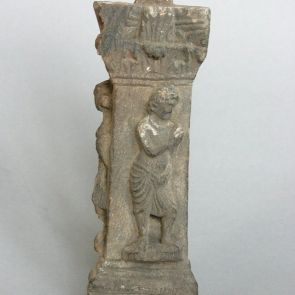 Fragment of a cornice with male figure