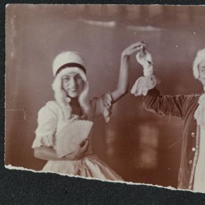 Indira from the left and Amrita from the right, both in costume (dancing allemande)