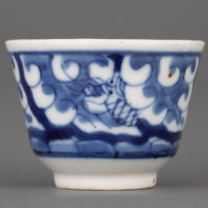 Cup decorated with dragon motifs