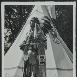 "Old Osprey" with a large feather decoration
