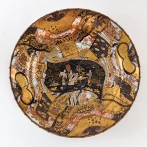 Dish with motifs of peonies and Chinese lions, re-decorated by Mór Fischer illustrating a paper scroll with Chinese figures