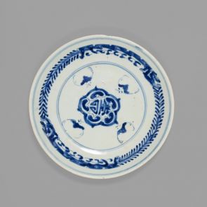 Blue and white plate with bats