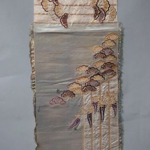 Japanese obi design sample with golden and lilac coloured Japanese tree and flower patterns