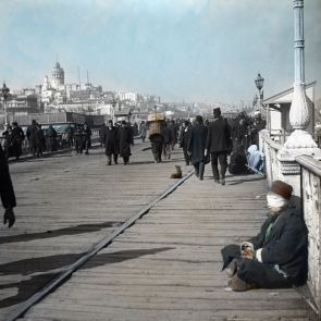 Constantinople. A blind beggar on Galata Bridge, with the famous Galata Tower in the background