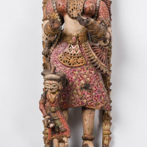 Female figure with attendant