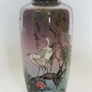 Vase with herons by the water design