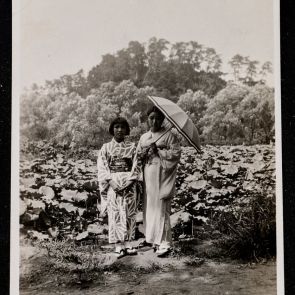 Seiko and Kimiko in front of the lotus pond, on their way to the Hachimangu Shrine