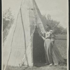 Aditi (Csikani) sitting in front of the open tent