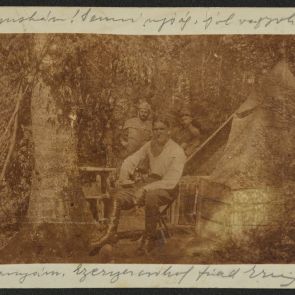 Baktay stands in front of a tent