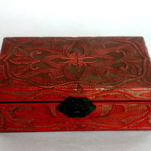 Carved red lacquer box with hinged lid
